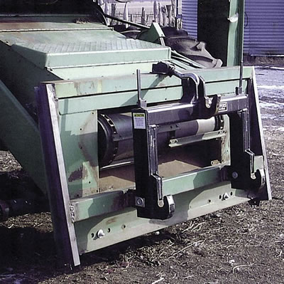 Combine Snowplow Doubles As A Bale Mover